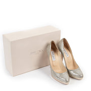 Buy second hand authentic Jimmy Choo Crown Champagne Gold Glitter Pumps at Labellov for the best price