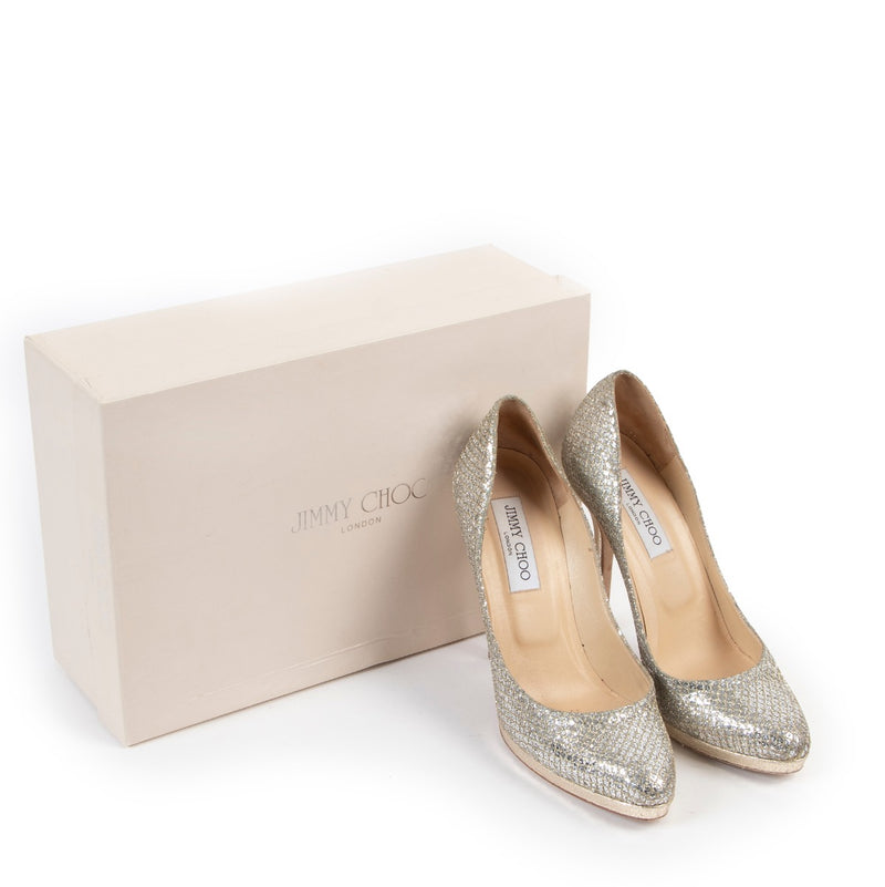 Buy second hand authentic Jimmy Choo Crown Champagne Gold Glitter Pumps at Labellov for the best price