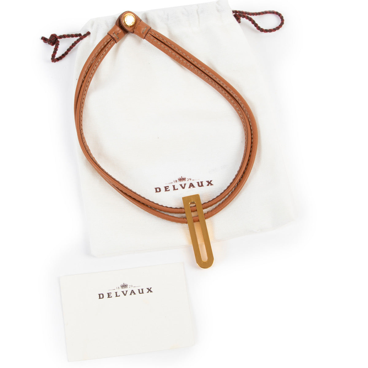Collier Delvaux en cuir cognac et or en forme de D