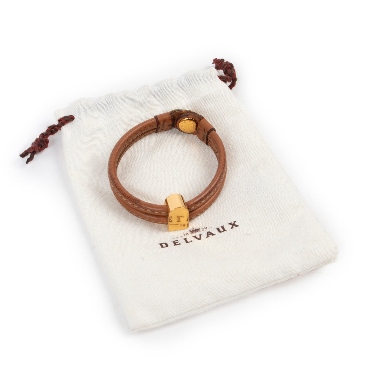 Shop safe online Delvaux cognac bracelet, Delvaux cognac bracelet in good condition, Preloved Delvaux bracelet in good condition.