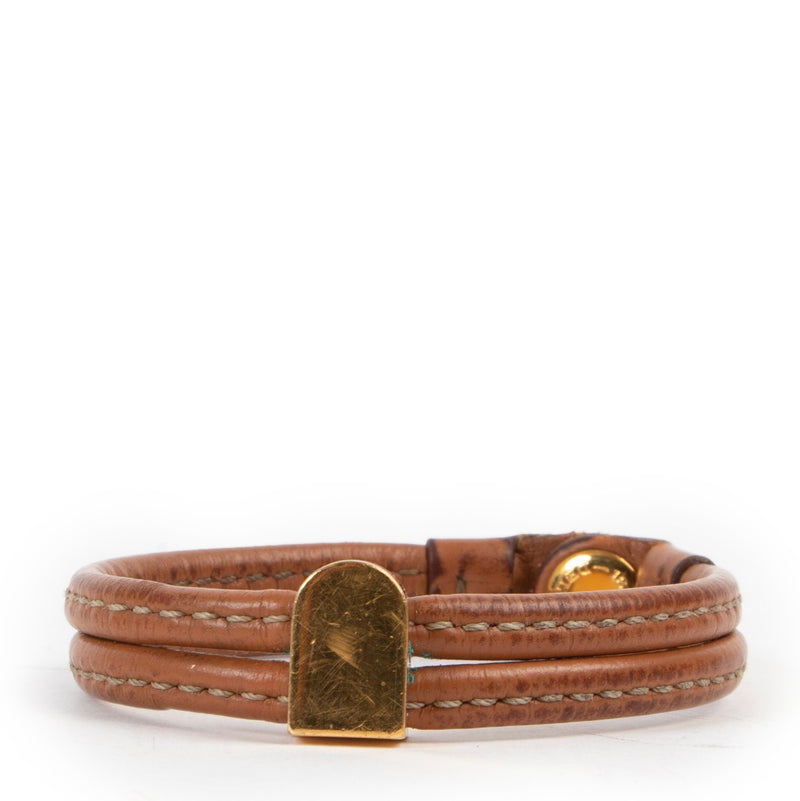 Shop safe online Delvaux cognac bracelet, Delvaux cognac bracelet in good condition, Preloved Delvaux bracelet in good condition.