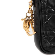 Christian Dior Black Lady Dior Clutch for the best price at Labellov secondhand luxury in Antwerp. We buy and sell your preloved and new designer bags.