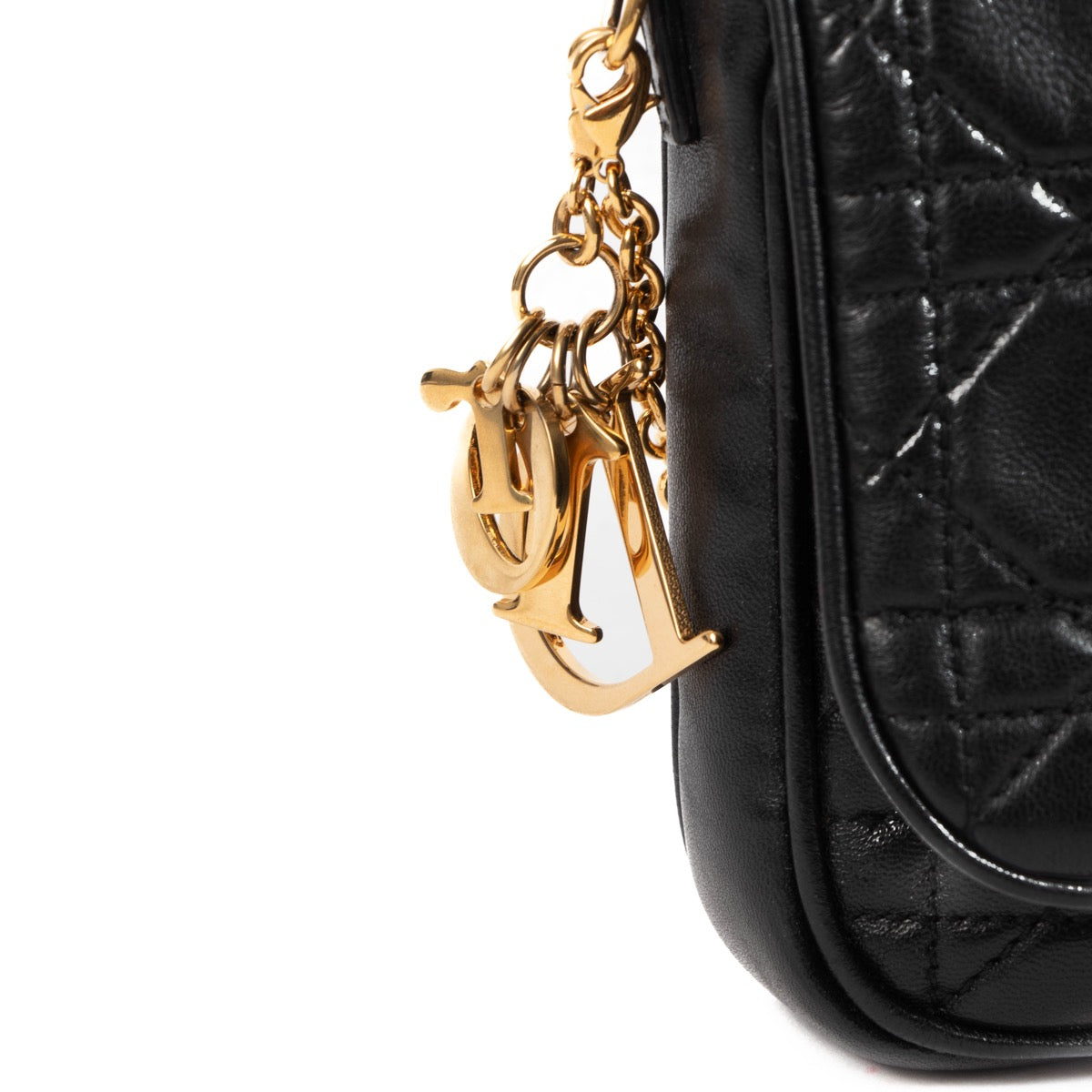 Christian Dior Black Lady Dior Clutch for the best price at Labellov secondhand luxury in Antwerp. We buy and sell your preloved and new designer bags.