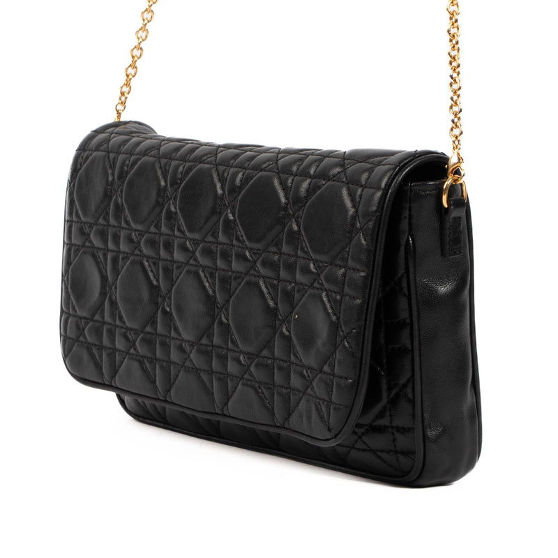 Christian Dior Black Lady Dior Clutch for the best price at Labellov secondhand luxury in Antwerp. We buy and sell your preloved and new designer bags.