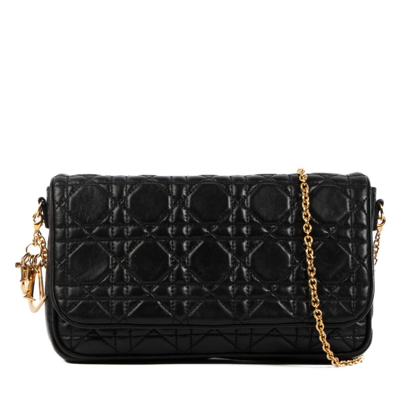 Christian Dior Black Lady Dior Clutch for the best price at Labellov secondhand luxury in Antwerp. We buy and sell your preloved and new designer bags.