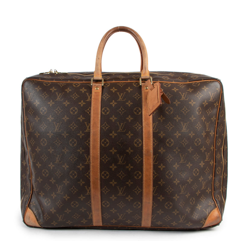 Louis Vuitton Sirius 55 Monogram Canvas Travel Bag for the best price at Labellov secondhand luxury in Antwerp