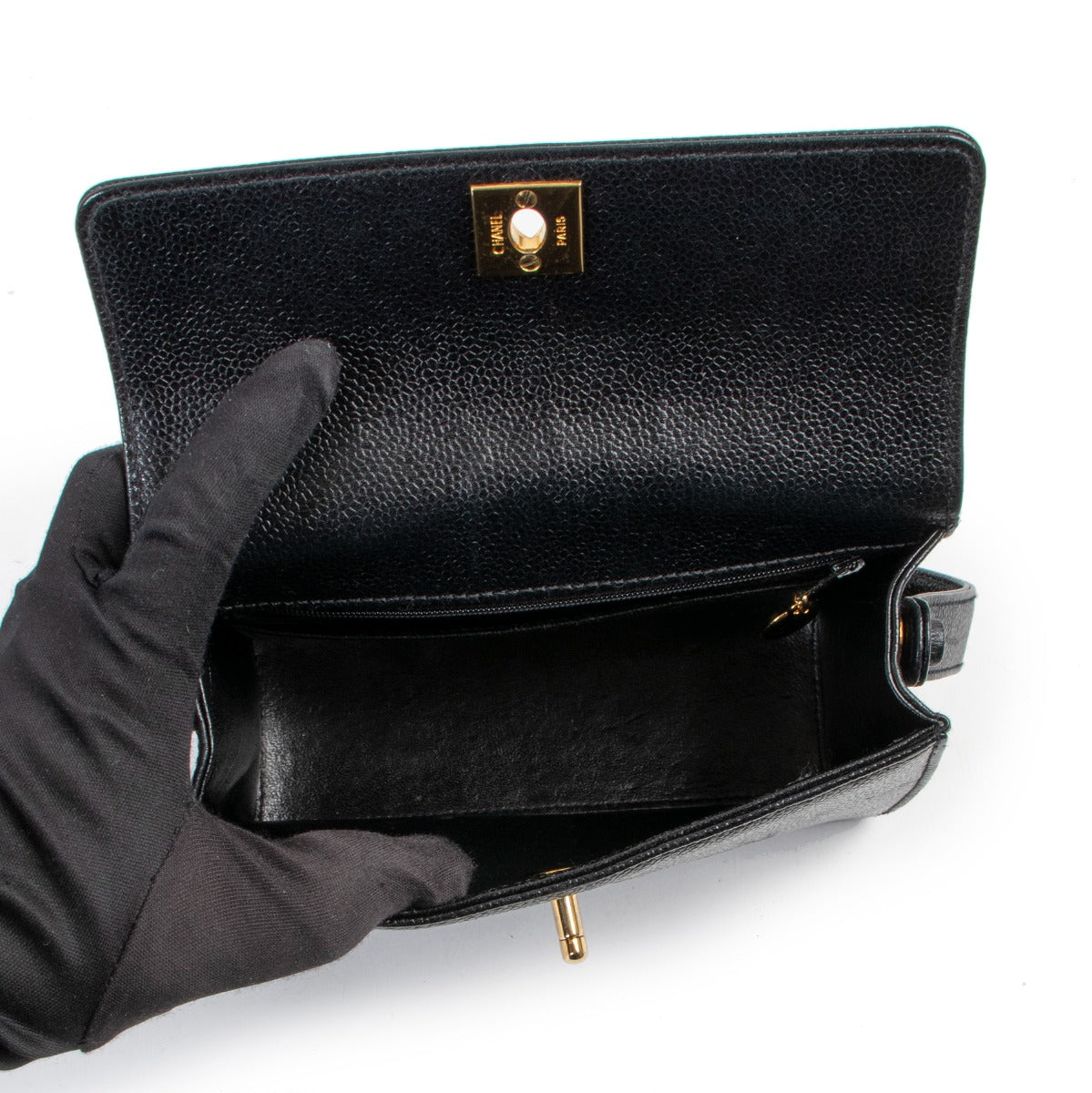 shop a 100% authentic second hand Chanel Vintage Black Caviar Mini Top Handle Bag at Labellov