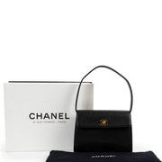shop a 100% authentic second hand Chanel Vintage Black Caviar Mini Top Handle Bag at Labellov