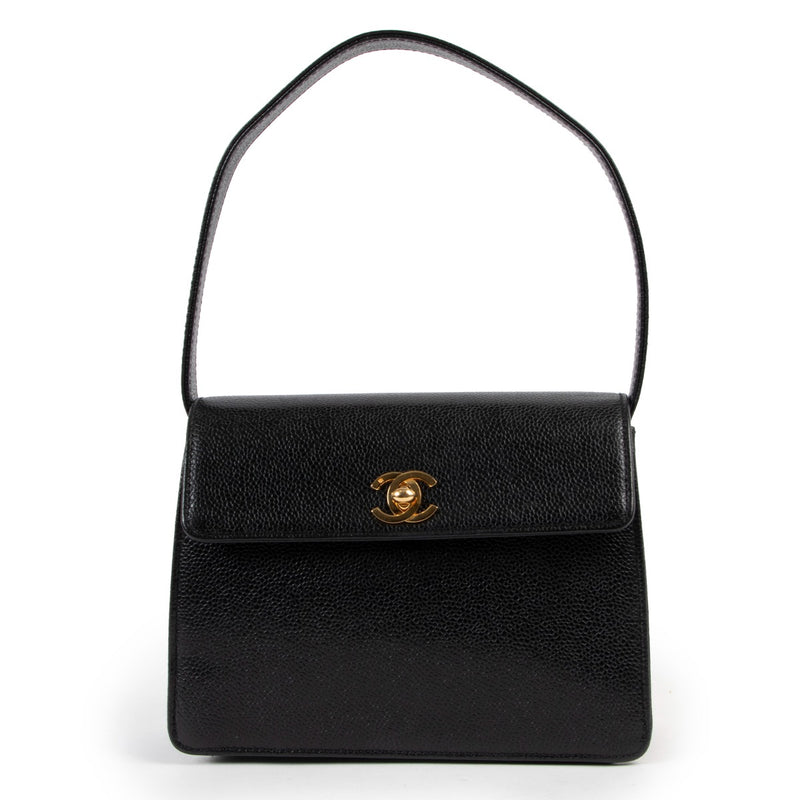 shop a 100% authentic second hand Chanel Vintage Black Caviar Mini Top Handle Bag at Labellov