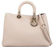 Christian Dior Powder Pink Diorissimo Shoulder Bag for the best price at Labellov secondhand luxury in Antwerp.