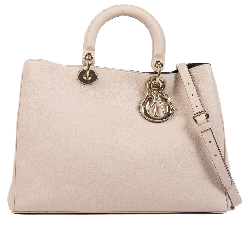 Christian Dior Powder Pink Diorissimo Shoulder Bag for the best price at Labellov secondhand luxury in Antwerp.