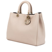 Christian Dior Powder Pink Diorissimo Shoulder Bag for the best price at Labellov secondhand luxury in Antwerp.