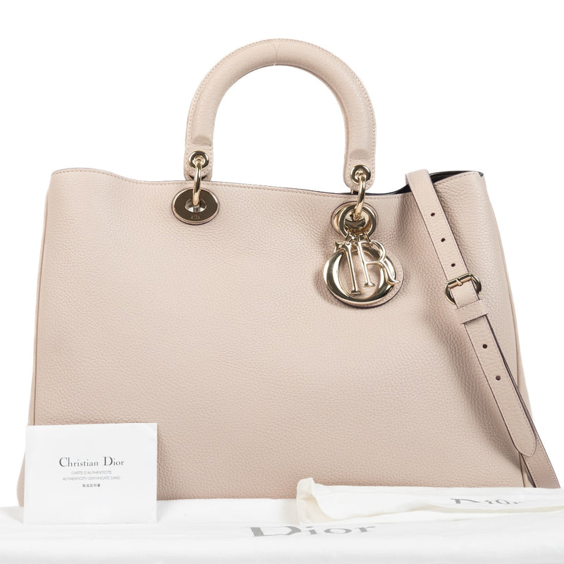 Christian Dior Powder Pink Diorissimo Shoulder Bag for the best price at Labellov secondhand luxury in Antwerp.