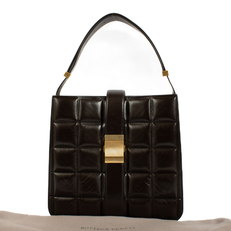 Bottega Veneta Fondant Padded Marie Bag in brown leather, featuring a padded design and elegant gold-tone hardware. Shop now on Labellov.