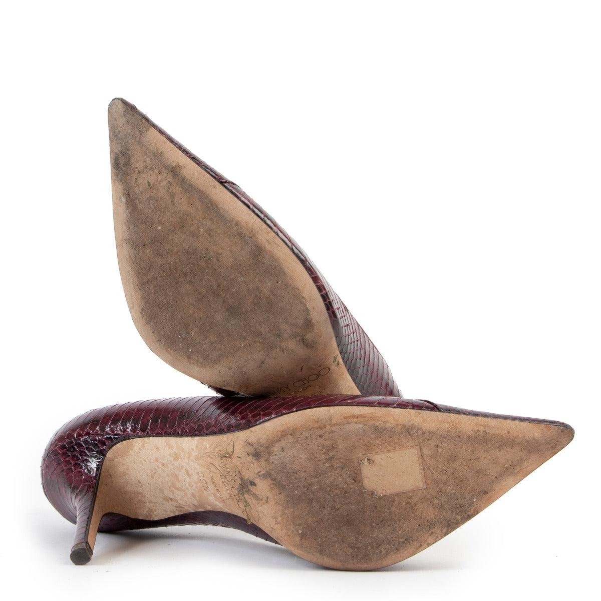 Buy an authentic pair of second hand Jimmy Choo purple snake leather pumps size 39,5 at Labellov
