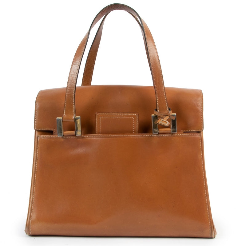 Shop safe online Delvaux cognac top handle bag in good condition. Sop online 100% authentic Delvaux top handle bag in good condition, Preloved Delvaux top handle bag in good condition.