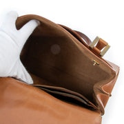 Shop safe online Delvaux cognac top handle bag in good condition. Sop online 100% authentic Delvaux top handle bag in good condition, Preloved Delvaux top handle bag in good condition.