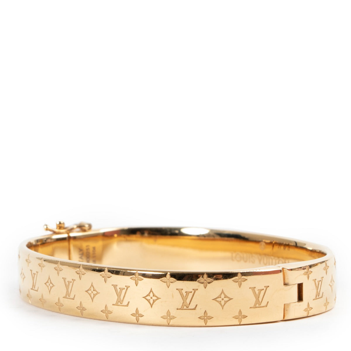 Shop authentic second hand luxury designer Louis Vuitton Nanogram Cuff Gold Bracelet at Labellov.