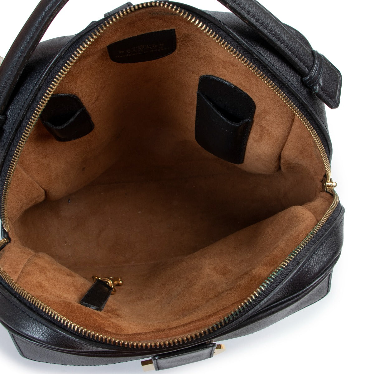 Buy luxury second hand designer high-end fashion Delvaux Onde Black Leather Backpack at Labellov.