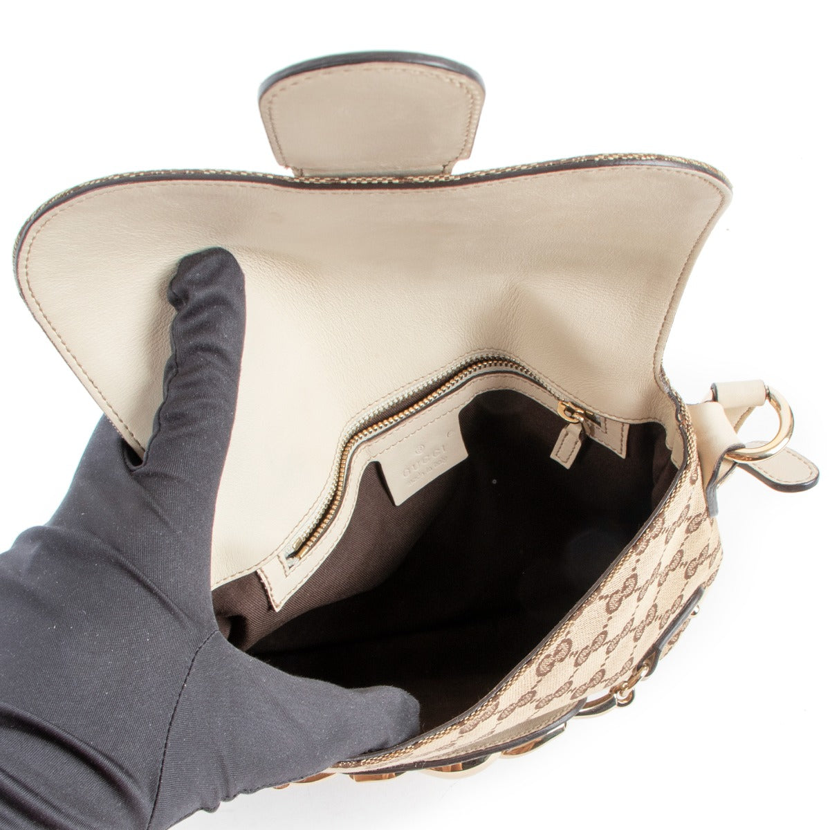 Buy online an authentic second handGucci Horsebit wave GG Canvas Shoulder Bag in very good condition at Labellov in Antwerp.