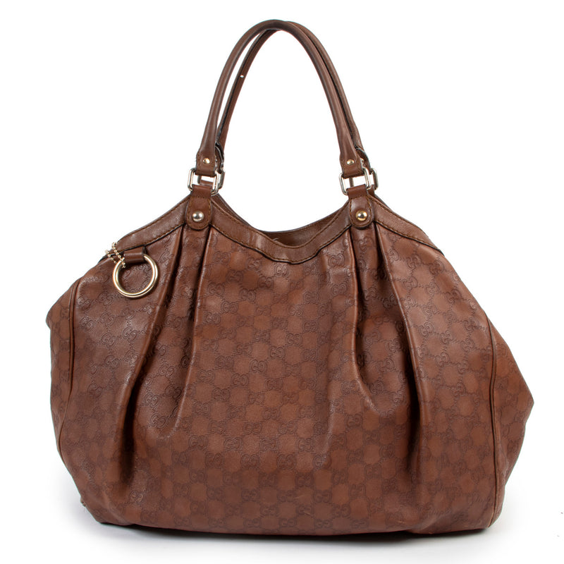 Gucci Brown Guccissima Large Sukey Tote Bag for the best price at Labellov secondhand luxury in Antwerp. Buy and sell your authentic designer bags online.