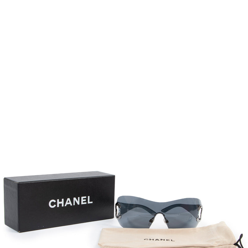 Chanel Black Silver CC Shield Sunglasses for the best price at Labellov secondhand luxury in Antwerp