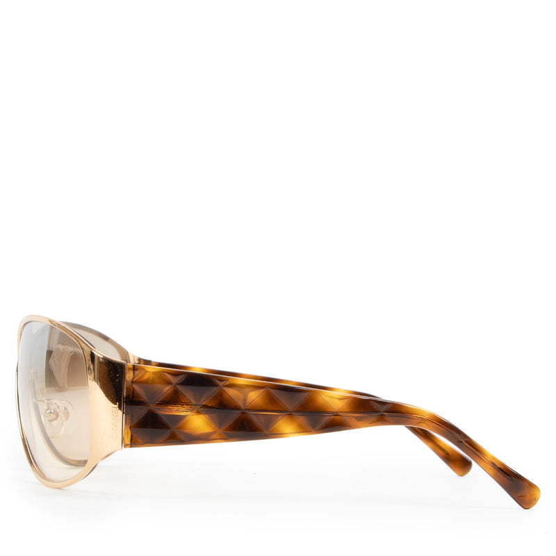 Buy an authentic pair of second hand Chanel Brown Quilted Frame Sunglasses at Labellov