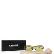 Shop safe online at Labellov in Antwerp this 100% authentic second hand Chanel Green Translucent Sunglasses
