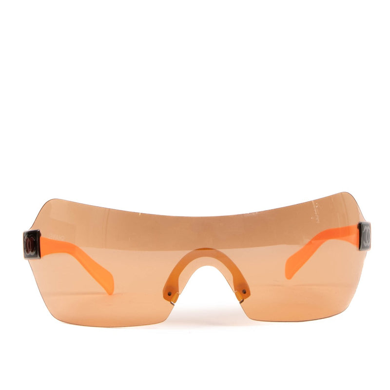 Shop safe online at Labellov in Antwerp, Brussels and Knokke these 100% authentic second hand Chanel Orange Acetate 4109 Shield Sunglasses