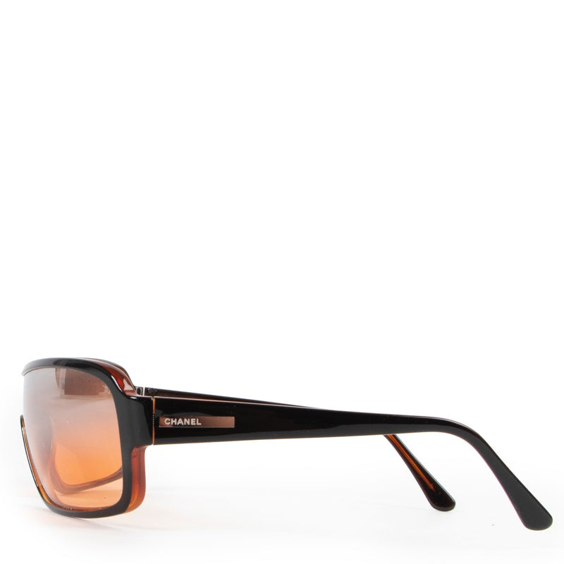 Buy an authentic pair of second hand Chanel Brown Mono-Sunglasses at Labellov