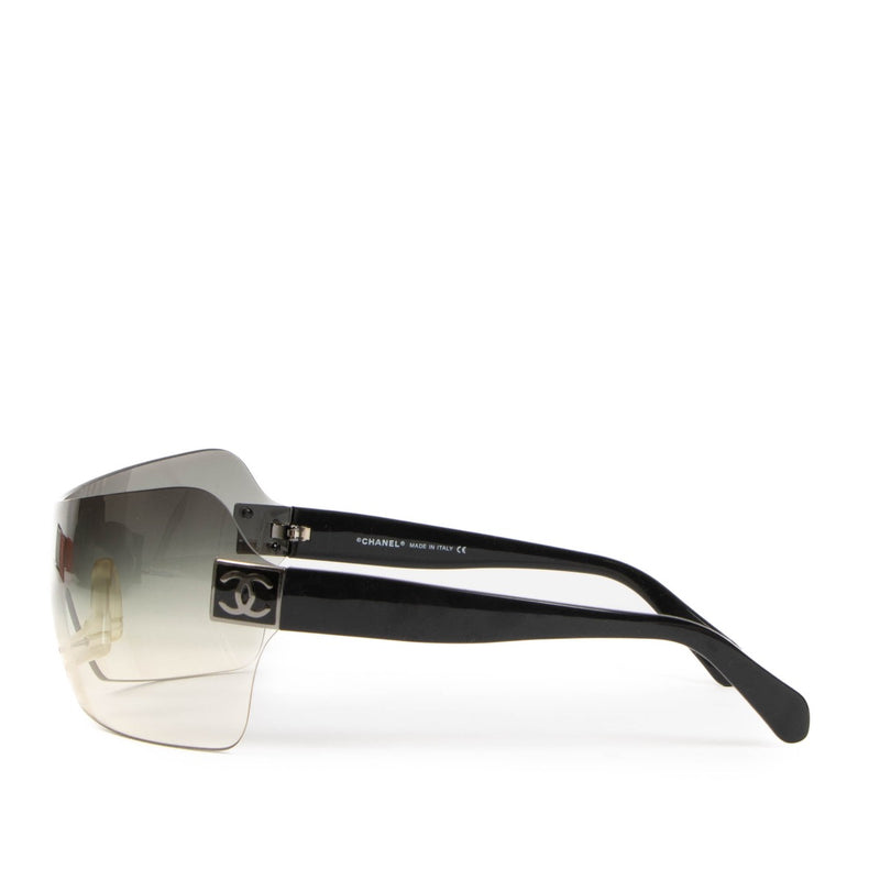 Shop safe online at Labellov these 100% authentic second hand Chanel black 4109 Shield Sunglasses