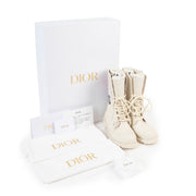 Buy a 100% authentic pair of second hand Diorcamp White Rubber Ankle Boots Size 37 at Labellov