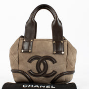 Authentic pre-loved Chanel CC Logo Suede Brown Shearling Bag on Labellov.com