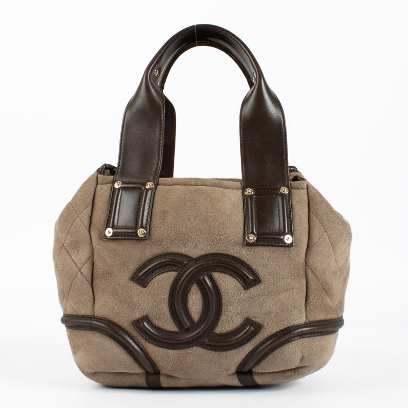 Authentic pre-loved Chanel CC Logo Suede Brown Shearling Bag on Labellov.com