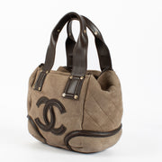 Authentic pre-loved Chanel CC Logo Suede Brown Shearling Bag on Labellov.com
