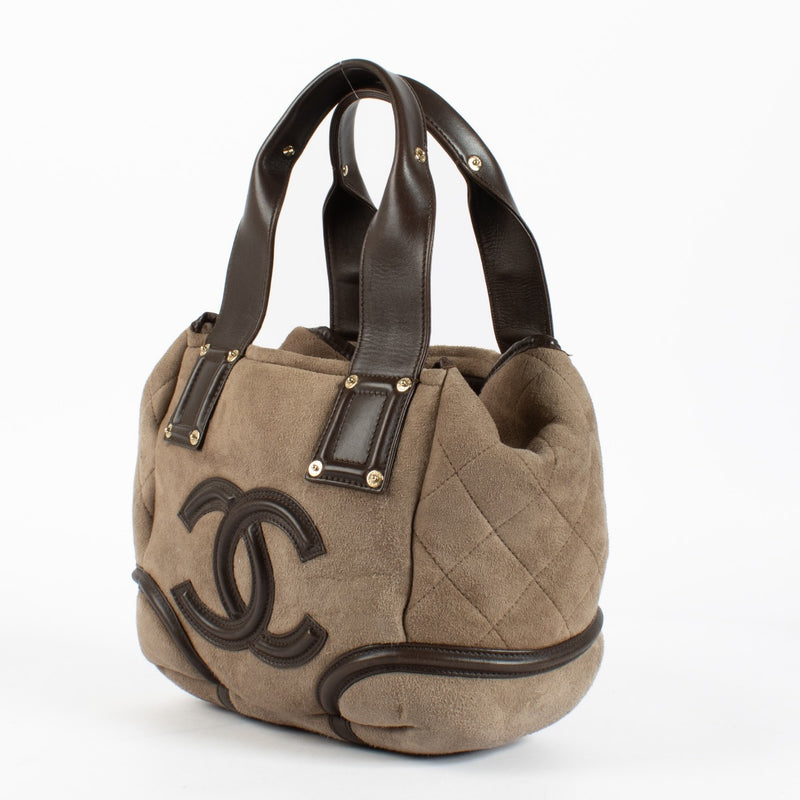 Authentic pre-loved Chanel CC Logo Suede Brown Shearling Bag on Labellov.com