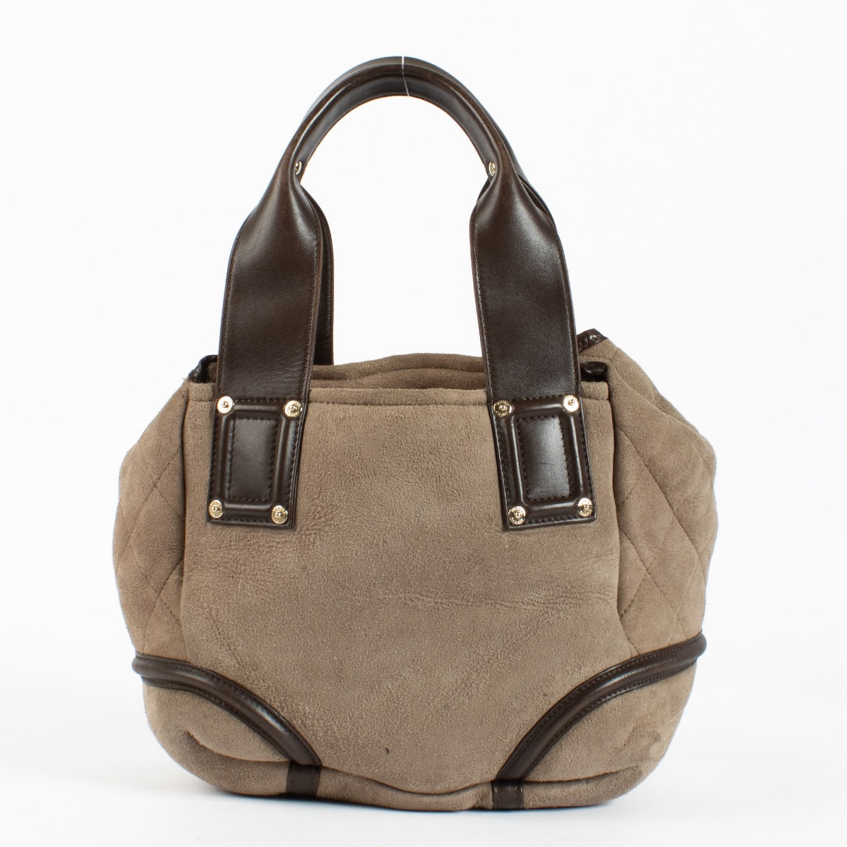 Authentic pre-loved Chanel CC Logo Suede Brown Shearling Bag on Labellov.com