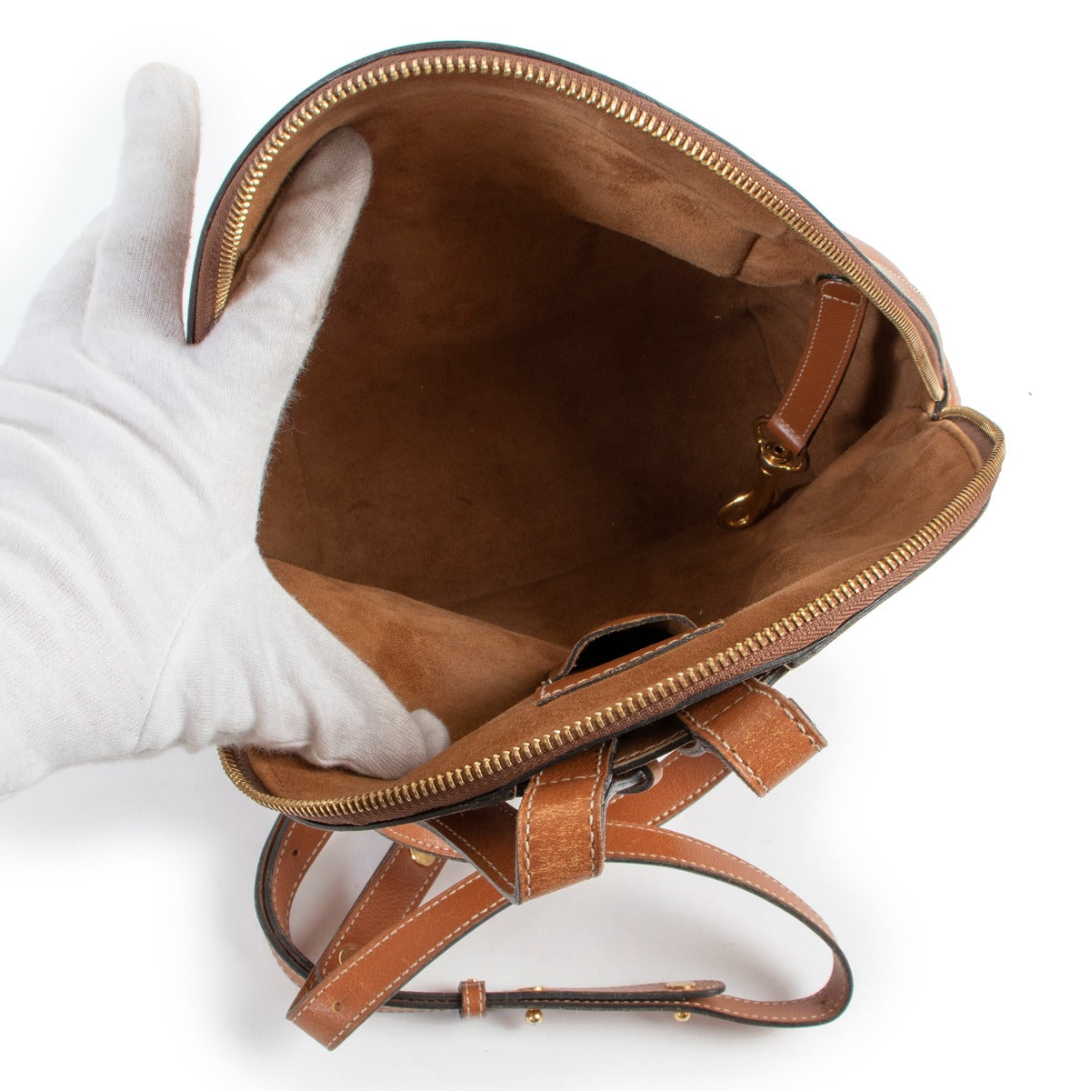 Shop vintage luxury designer second hand Delvaux Vintage Amitie Cognac Leather Backpack at Labellov.