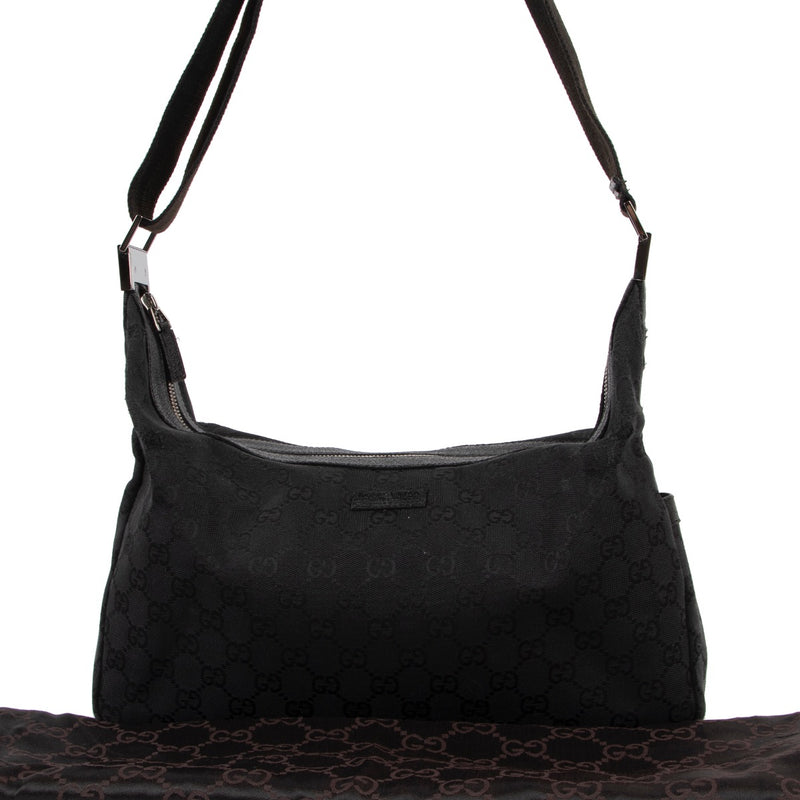 Buy a 100% authentic second hand Gucci Black Canvas Monogram Crossbody in good condition at Labellov