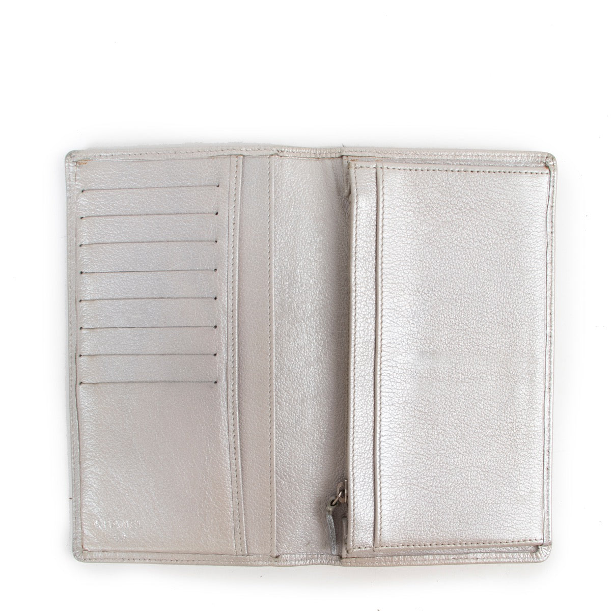 Shop authentic second hand designer vintage Chanel Metallic Silver Camellia Long Flap Wallet at Labellov.