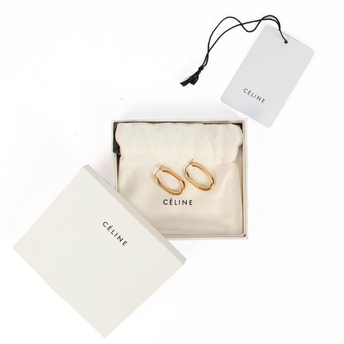 Celine Gold Brass Toned Oval Hoop Earrings