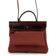 Buy an authentic second hand Hermès Herbag Zip 31 Retourné Quadricolor Bag as new at Labellov