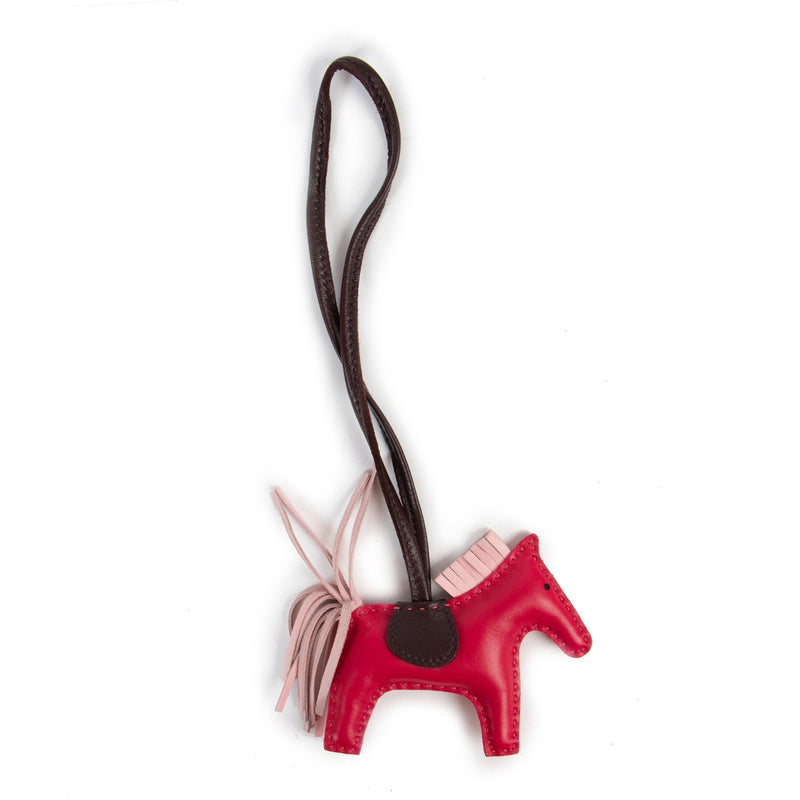 Shop safe online at Labellov in Antwerp this 100% authentic second hand Hermès Framboise Lambskin Rodéo PM Bag Charm