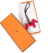 Shop safe online at Labellov in Antwerp this 100% authentic second hand Hermès Framboise Lambskin Rodéo PM Bag Charm