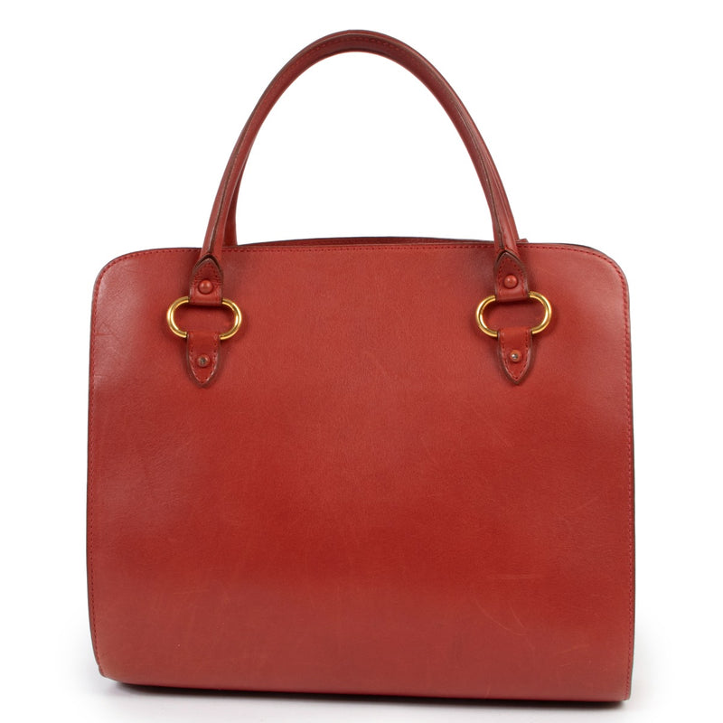 Shop second hand authentic designer vintage Delvaux Red Leather Tote Bag at Labellov.