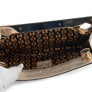 Buy an authentic second hand Gucci Gold Britt Clutch in excellent condition at Labellov