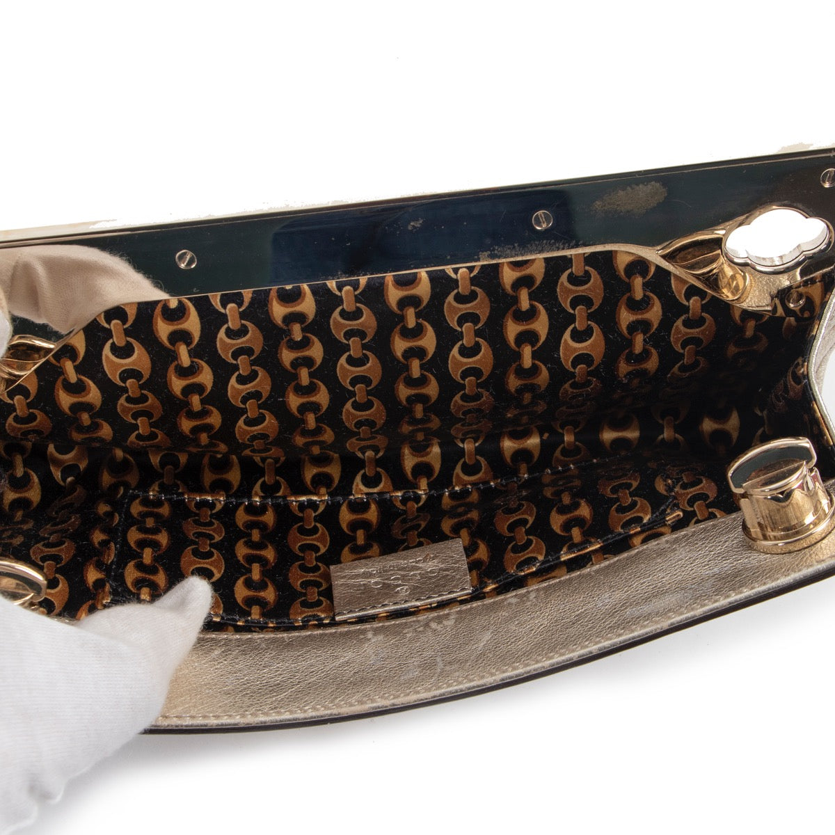 Buy an authentic second hand Gucci Gold Britt Clutch in excellent condition at Labellov