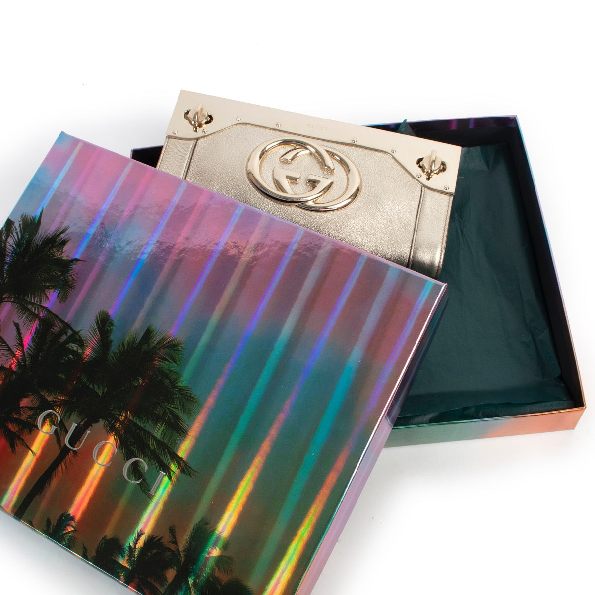 Buy an authentic second hand Gucci Gold Britt Clutch in excellent condition at Labellov