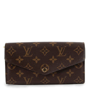 Shop safe online at Labellov in Antwerp this 100% authentic second hand Louis Vuitton Monogram Canvas Sarah Wallet