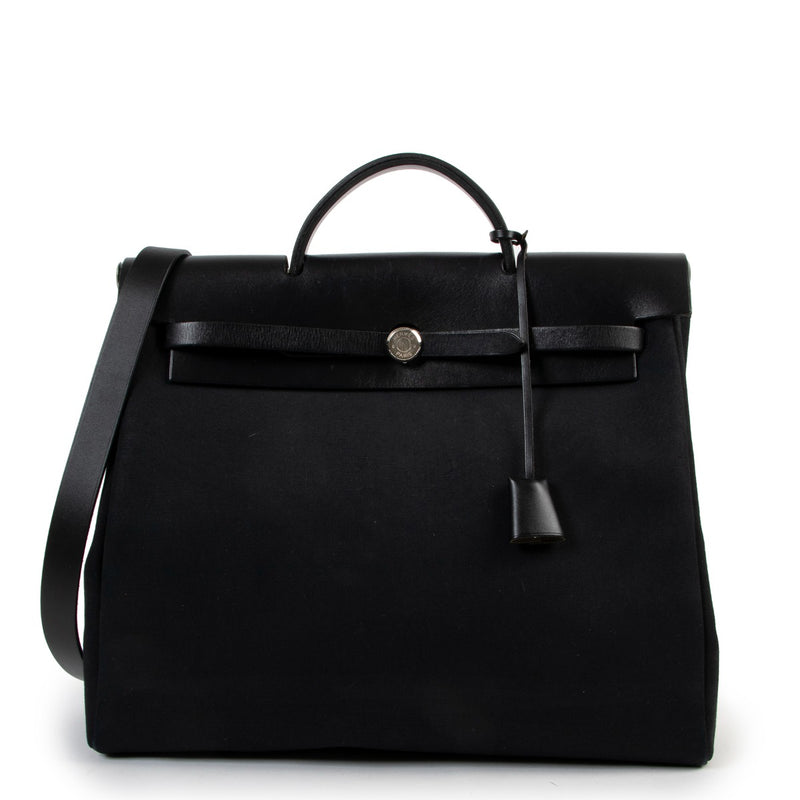 Shop now your pre-loved designer Hermès Top Handle bags at Labellov.